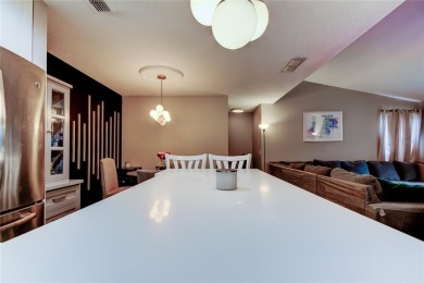 Something Special Awaits! Welcome to this fully renovated on Hunters Green Country Club in Florida - for sale on GolfHomes.com, golf home, golf lot