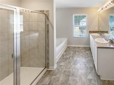 Discover this beautifully designed home featuring an on Canongate At Heron Bay in Georgia - for sale on GolfHomes.com, golf home, golf lot