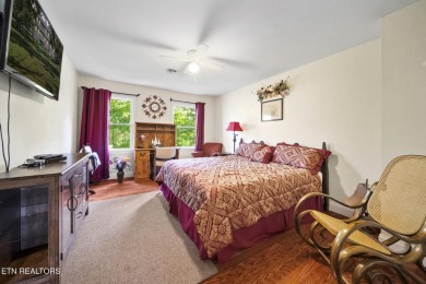 Set on a lush, green lot in the heart of Baneberry, this warm on Baneberry Golf and Resort Club in Tennessee - for sale on GolfHomes.com, golf home, golf lot