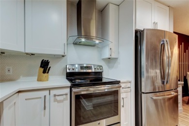 Something Special Awaits! Welcome to this fully renovated on Hunters Green Country Club in Florida - for sale on GolfHomes.com, golf home, golf lot