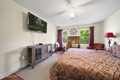 Set on a lush, green lot in the heart of Baneberry, this warm on Baneberry Golf and Resort Club in Tennessee - for sale on GolfHomes.com, golf home, golf lot