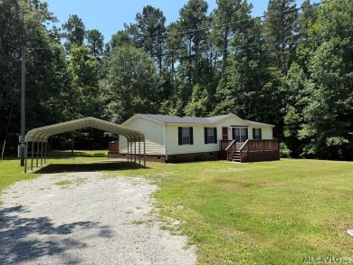 This freshly remodeled 3-bedroom, 2-bath doublewide is move-in on Tanglewood Shores Golf Club in Virginia - for sale on GolfHomes.com, golf home, golf lot