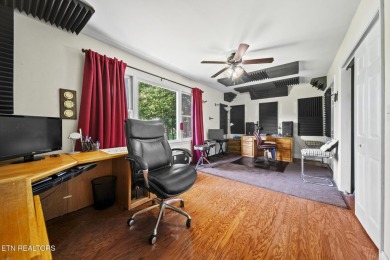 Set on a lush, green lot in the heart of Baneberry, this warm on Baneberry Golf and Resort Club in Tennessee - for sale on GolfHomes.com, golf home, golf lot