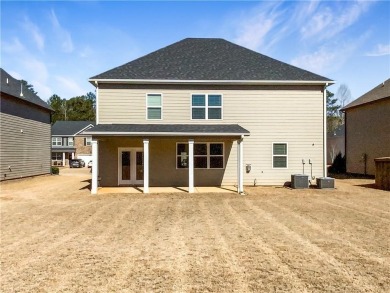 Discover this beautifully designed home featuring an on Canongate At Heron Bay in Georgia - for sale on GolfHomes.com, golf home, golf lot