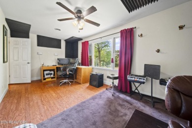 Set on a lush, green lot in the heart of Baneberry, this warm on Baneberry Golf and Resort Club in Tennessee - for sale on GolfHomes.com, golf home, golf lot