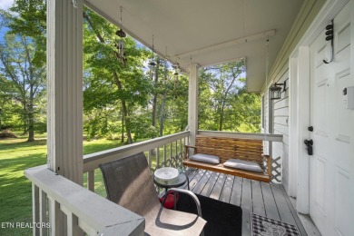 Set on a lush, green lot in the heart of Baneberry, this warm on Baneberry Golf and Resort Club in Tennessee - for sale on GolfHomes.com, golf home, golf lot