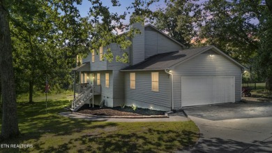 Set on a lush, green lot in the heart of Baneberry, this warm on Baneberry Golf and Resort Club in Tennessee - for sale on GolfHomes.com, golf home, golf lot
