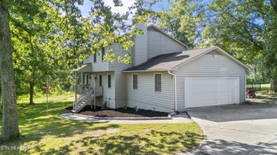 Set on a lush, green lot in the heart of Baneberry, this warm on Baneberry Golf and Resort Club in Tennessee - for sale on GolfHomes.com, golf home, golf lot