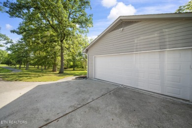 Set on a lush, green lot in the heart of Baneberry, this warm on Baneberry Golf and Resort Club in Tennessee - for sale on GolfHomes.com, golf home, golf lot
