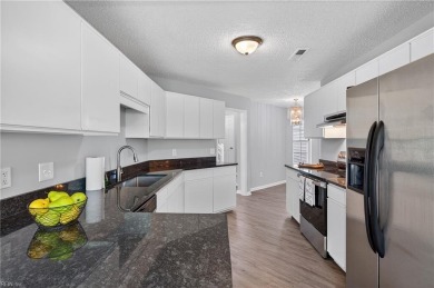 Beautifully renovated 3-bedroom, 2.5-bath condo with soaring on Cypress Point Country Club in Virginia - for sale on GolfHomes.com, golf home, golf lot