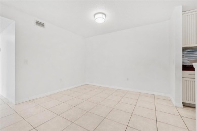 This 2 bedroom, 1 Bath condo is located in The Highlands, one of on Hunters Green Country Club in Florida - for sale on GolfHomes.com, golf home, golf lot