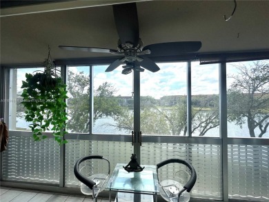 Spacious Magnolia corner unit with a lake view at Century on Flamingo Lakes Country Club in Florida - for sale on GolfHomes.com, golf home, golf lot