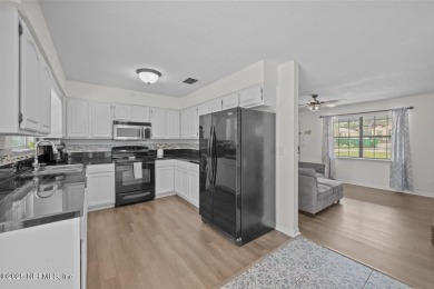 Affordable turn key home situated on nice lot w/circular on Palatka Golf Club in Florida - for sale on GolfHomes.com, golf home, golf lot