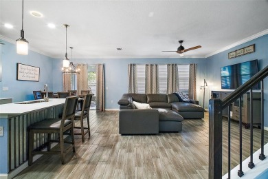 Welcome to this beautifully appointed two-story home nestled in on Mount Dora Golf Club in Florida - for sale on GolfHomes.com, golf home, golf lot