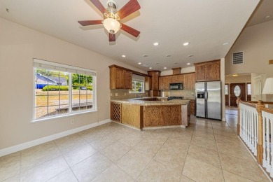 Located on a corner lot overlooking the 8th fairway of the on Yosemite Lakes Park Golf Course in California - for sale on GolfHomes.com, golf home, golf lot