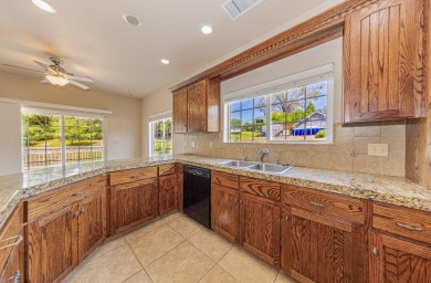 Located on a corner lot overlooking the 8th fairway of the on Yosemite Lakes Park Golf Course in California - for sale on GolfHomes.com, golf home, golf lot