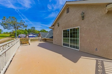 Located on a corner lot overlooking the 8th fairway of the on Yosemite Lakes Park Golf Course in California - for sale on GolfHomes.com, golf home, golf lot