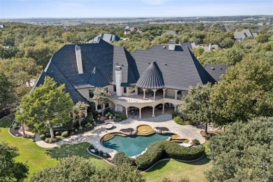 Nestled within the prestigious guard-gated Tour 18 community on Tour 18 Golf Course Dallas in Texas - for sale on GolfHomes.com, golf home, golf lot
