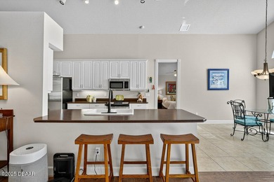 Experience the best of Florida living in this beautifully on Plantation Bay Golf and Country Club in Florida - for sale on GolfHomes.com, golf home, golf lot