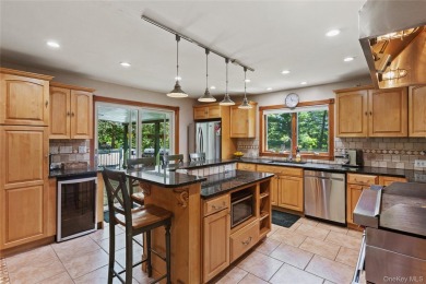 Welcome to this beautifully maintained 4-bedroom, 2-bath ranch on Mahopac Golf Club in New York - for sale on GolfHomes.com, golf home, golf lot