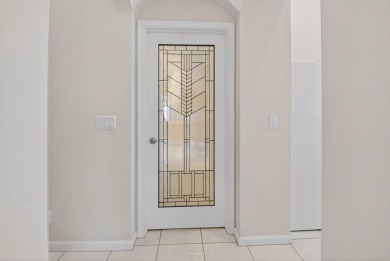 Welcome home to your slice of Florida paradise! IMMACULATE and on Aberdeen Golf and Country Club in Florida - for sale on GolfHomes.com, golf home, golf lot
