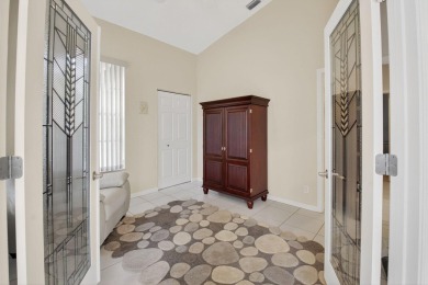 Welcome home to your slice of Florida paradise! IMMACULATE and on Aberdeen Golf and Country Club in Florida - for sale on GolfHomes.com, golf home, golf lot