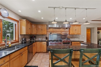 Welcome to this beautifully maintained 4-bedroom, 2-bath ranch on Mahopac Golf Club in New York - for sale on GolfHomes.com, golf home, golf lot