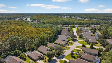 Experience the best of Florida living in this beautifully on Plantation Bay Golf and Country Club in Florida - for sale on GolfHomes.com, golf home, golf lot