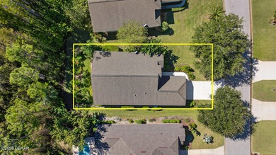 Experience the best of Florida living in this beautifully on Plantation Bay Golf and Country Club in Florida - for sale on GolfHomes.com, golf home, golf lot