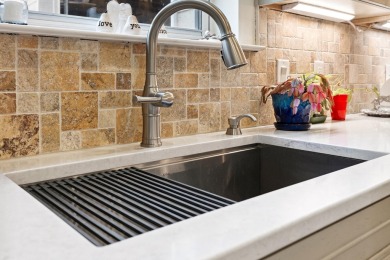 Located in the picturesque community of Crystal Lake, this on Sandestin Golf and Beach Resort - Raven in Florida - for sale on GolfHomes.com, golf home, golf lot