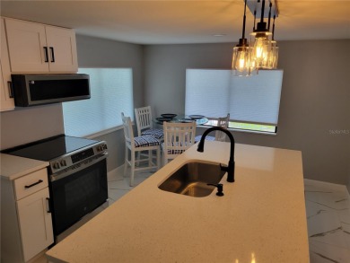 One or more photo(s) has been virtually staged. One or more on Betmar Acres Golf Club in Florida - for sale on GolfHomes.com, golf home, golf lot