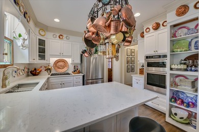 Stately and beautifully remodeled 4-bedroom, 3.5-bath brick home on West Lake Country Club in Georgia - for sale on GolfHomes.com, golf home, golf lot