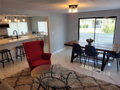 One or more photo(s) has been virtually staged. One or more on Betmar Acres Golf Club in Florida - for sale on GolfHomes.com, golf home, golf lot