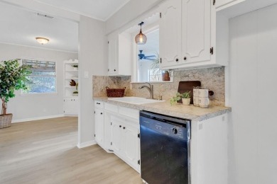 This adorable home offers the perfect blend of casual living and on Hide-A-Way Lake Golf Course in Texas - for sale on GolfHomes.com, golf home, golf lot