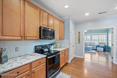 Are you looking for a Turn-Key home with a backyard pool oasis on Beau Rivage Golf and Resort in North Carolina - for sale on GolfHomes.com, golf home, golf lot