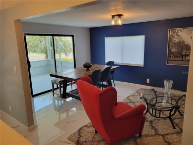One or more photo(s) has been virtually staged. One or more on Betmar Acres Golf Club in Florida - for sale on GolfHomes.com, golf home, golf lot