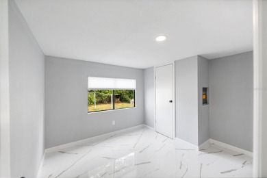 One or more photo(s) has been virtually staged. One or more on Betmar Acres Golf Club in Florida - for sale on GolfHomes.com, golf home, golf lot