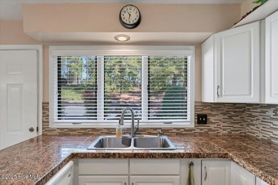 Don't miss this golf front condo with golf and WATER views on a on Whispering Woods in North Carolina - for sale on GolfHomes.com, golf home, golf lot