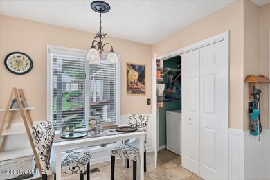 Don't miss this golf front condo with golf and WATER views on a on Whispering Woods in North Carolina - for sale on GolfHomes.com, golf home, golf lot