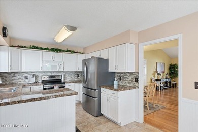 Don't miss this golf front condo with golf and WATER views on a on Whispering Woods in North Carolina - for sale on GolfHomes.com, golf home, golf lot