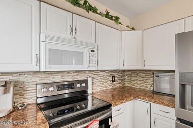 Don't miss this golf front condo with golf and WATER views on a on Whispering Woods in North Carolina - for sale on GolfHomes.com, golf home, golf lot