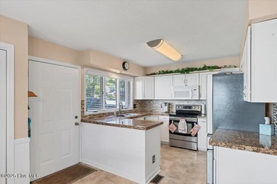 Don't miss this golf front condo with golf and WATER views on a on Whispering Woods in North Carolina - for sale on GolfHomes.com, golf home, golf lot