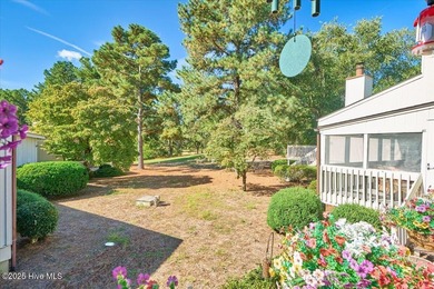Don't miss this golf front condo with golf and WATER views on a on Whispering Woods in North Carolina - for sale on GolfHomes.com, golf home, golf lot