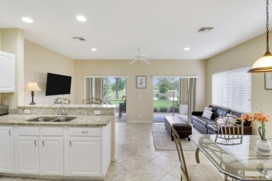 Location, location, location! SERENE LAKE VIEWS & PARTIAL GOLF on The Legacy Golf and Tennis Club in Florida - for sale on GolfHomes.com, golf home, golf lot