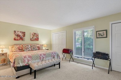 Don't miss this golf front condo with golf and WATER views on a on Whispering Woods in North Carolina - for sale on GolfHomes.com, golf home, golf lot