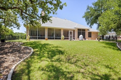 Gorgeous - fantastic drive up appeal and outstanding fairway on Pecan Plantation Country Club in Texas - for sale on GolfHomes.com, golf home, golf lot
