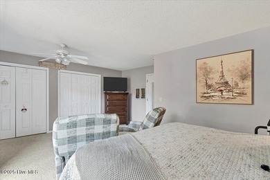 Don't miss this golf front condo with golf and WATER views on a on Whispering Woods in North Carolina - for sale on GolfHomes.com, golf home, golf lot