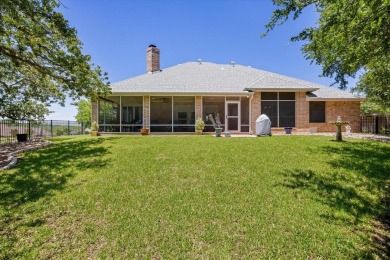 Gorgeous - fantastic drive up appeal and outstanding fairway on Pecan Plantation Country Club in Texas - for sale on GolfHomes.com, golf home, golf lot