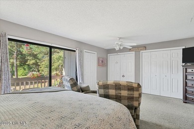 Don't miss this golf front condo with golf and WATER views on a on Whispering Woods in North Carolina - for sale on GolfHomes.com, golf home, golf lot