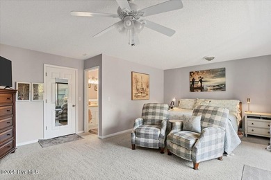 Don't miss this golf front condo with golf and WATER views on a on Whispering Woods in North Carolina - for sale on GolfHomes.com, golf home, golf lot